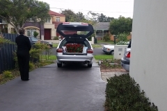 thumbs_Silver-hearse-open-at-family-home